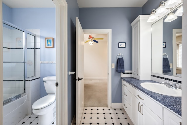 13615 N Riverbluff Ln, Spokane, WA 99208 - bathroom featuring enclosed tub / shower combo, vanity, and toilet