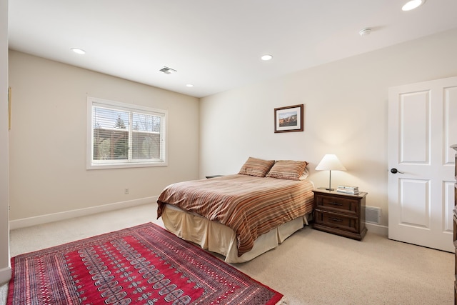 13615 N Riverbluff Ln, Spokane, WA 99208 - bedroom with light colored carpet, baseboards, visible vents, and recessed lighting