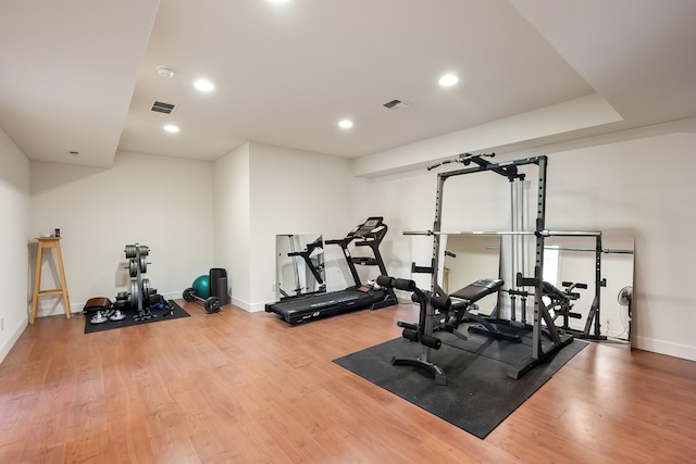 13615 N Riverbluff Ln, Spokane, WA 99208 - exercise area featuring visible vents, baseboards, and wood finished floors