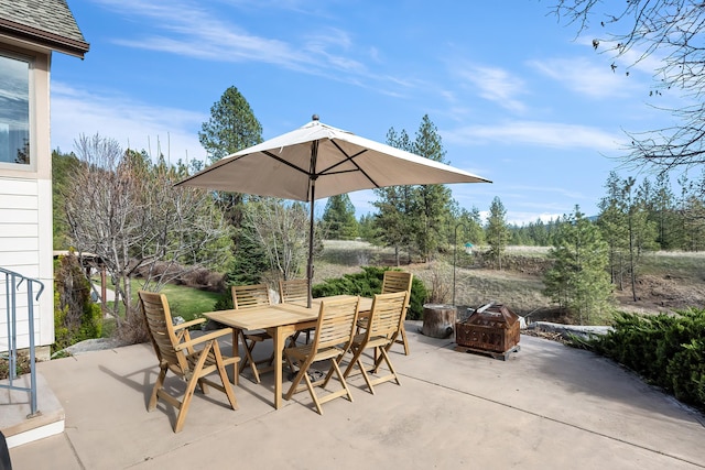 13615 N Riverbluff Ln, Spokane, WA 99208 - view of patio / terrace featuring an outdoor fire pit and outdoor dining area