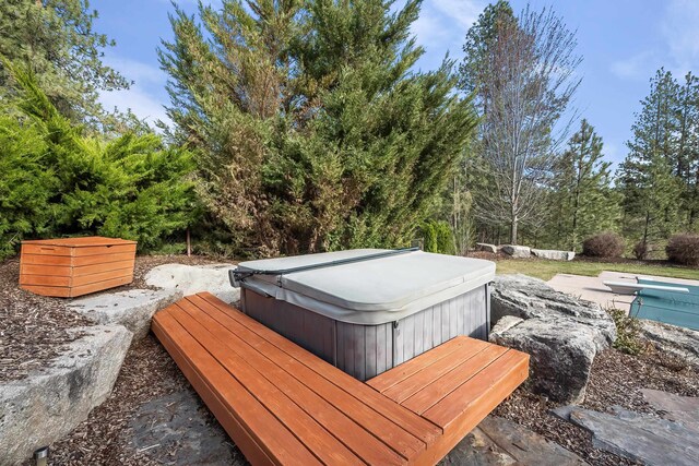 13615 N Riverbluff Ln, Spokane, WA 99208 - exterior space with a swimming pool and a hot tub