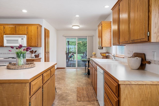 2603 S Sunnybrook Ln, Spokane, WA 99037 - kitchen with white appliances, light countertops, tasteful backsplash, recessed lighting, and light floors