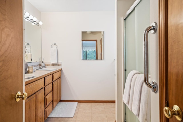 2603 S Sunnybrook Ln, Spokane, WA 99037 - full bath with double vanity, tile patterned flooring, and a shower with door