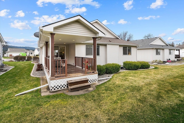 2603 S Sunnybrook Ln, Spokane, WA 99037 - back of property featuring a lawn and a wooden deck