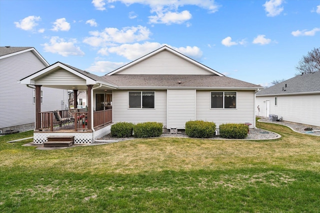 2603 S Sunnybrook Ln, Spokane, WA 99037 - back of property featuring a lawn and roof with shingles