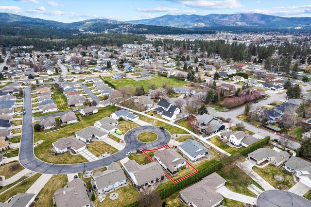 2603 S Sunnybrook Ln, Spokane, WA 99037 - aerial view of residential area featuring a mountainous background and property boundaries highlighted