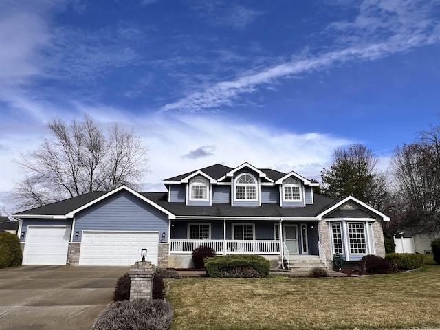 15803 E 21st Ave, Spokane Valley, WA 99037 - view of front of property featuring a porch, an attached garage, driveway, and a front yard