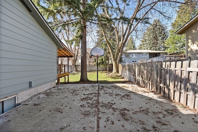 view of yard with a patio and a fenced backyard