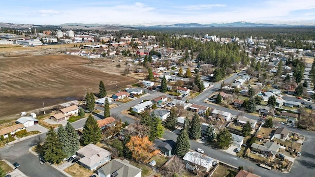 aerial view featuring a residential view and a mountain view