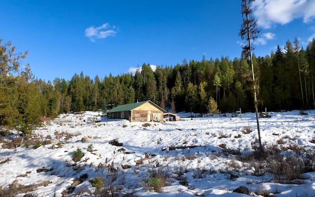 2467 Widow Rd Unit D, Colville, WA 99114 - snowy landscape featuring a forest view
