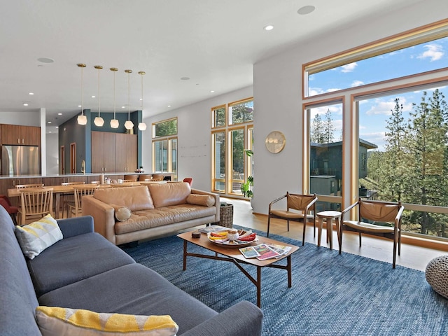 living area featuring a wealth of natural light and recessed lighting