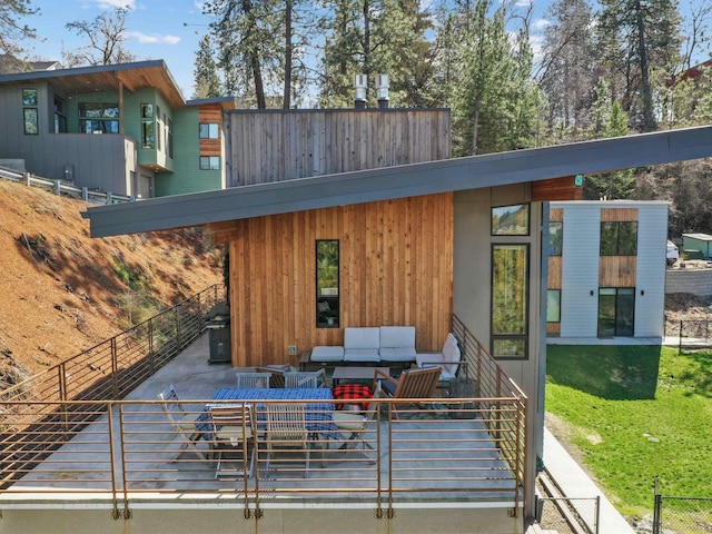 exterior space featuring a patio area and fence