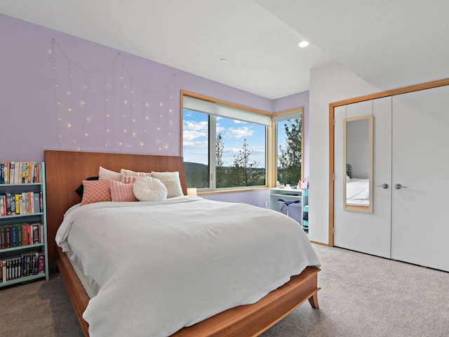 carpeted bedroom featuring recessed lighting