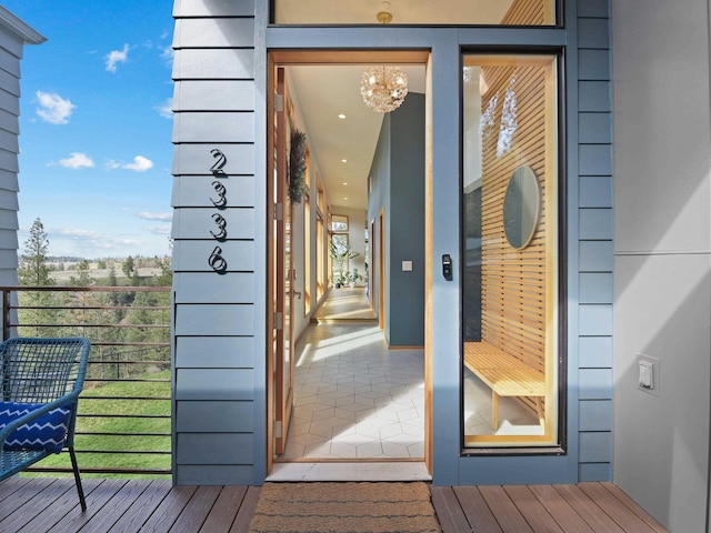 entrance to property featuring a balcony