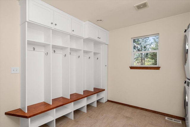 mudroom with baseboards and visible vents