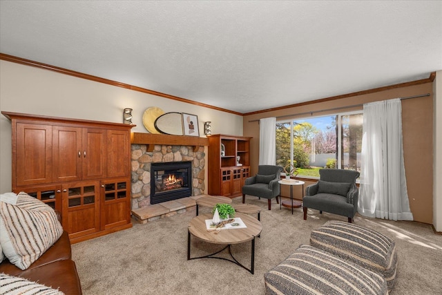 living room featuring ornamental molding, a stone fireplace, and carpet