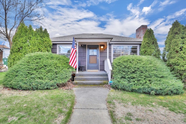 2715 W Longfellow Ave, Spokane, WA 99205 - view of front of property with a chimney