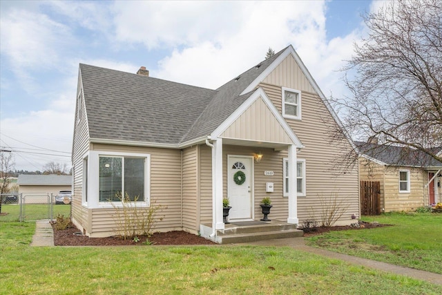 2610 W Sanson Ave, Spokane, WA 99205 - view of front of house featuring board and batten siding, roof with shingles, a chimney, and a gate