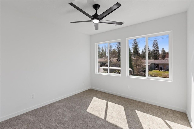 1920 E 37th Ave, Spokane, WA 99203 - empty room with carpet floors, baseboards, and ceiling fan