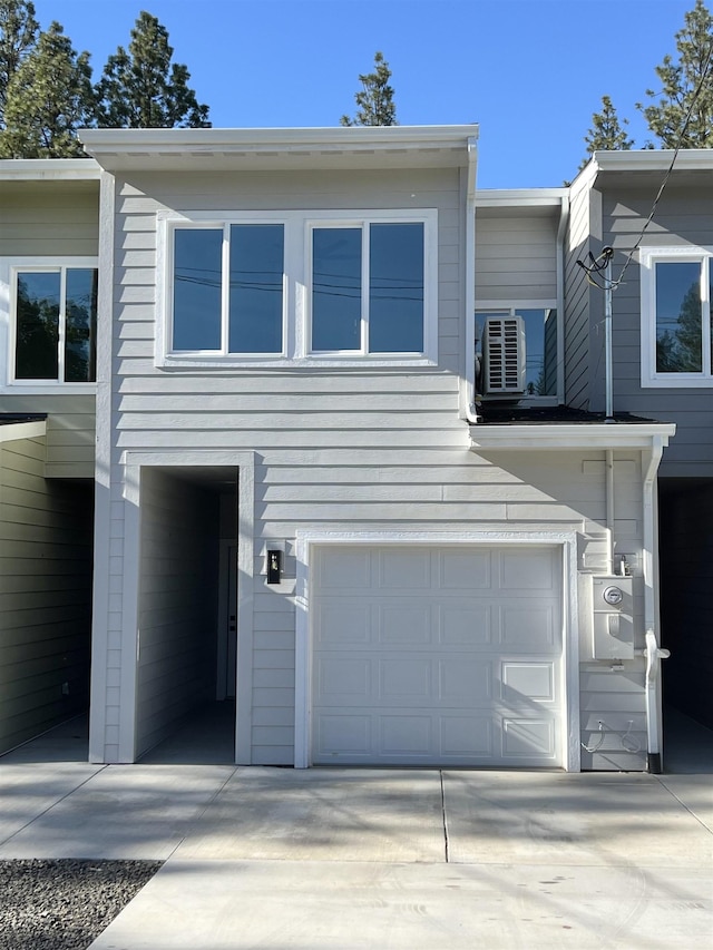 1920 E 37th Ave, Spokane, WA 99203 - townhome / multi-family property with a garage and driveway