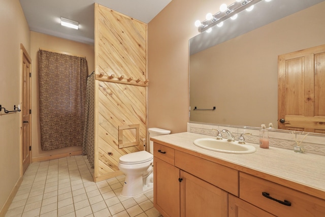 full bathroom with toilet, tile patterned floors, vanity, and a shower with curtain