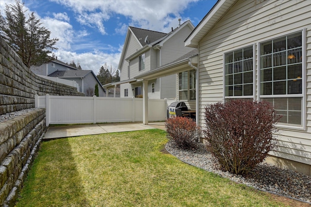 view of yard featuring a patio area and fence