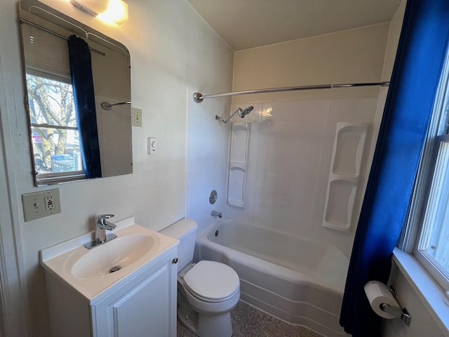 full bath with toilet, vanity, and  shower combination