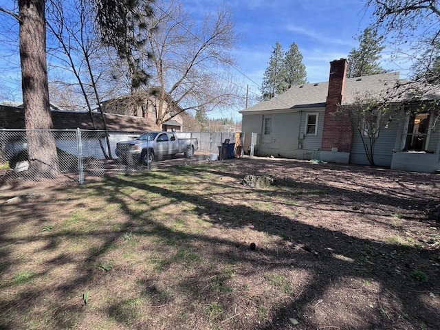 view of yard featuring fence