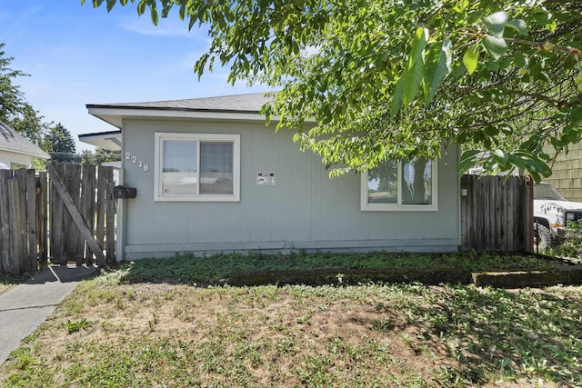 2218 E Hartson Ave, Spokane, WA 99202 - view of front of property featuring a shingled roof and a gate