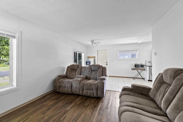 2218 E Hartson Ave, Spokane, WA 99202 - living room featuring ceiling fan and light wood-style flooring