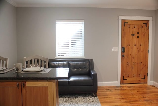 306 2nd St # 3 Id, Mullan, ID 83846 - living room with ornamental molding, baseboards, and light wood finished floors