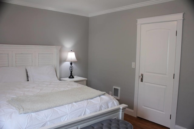 306 2nd St # 3 Id, Mullan, ID 83846 - bedroom featuring crown molding, visible vents, baseboards, and dark wood-style flooring