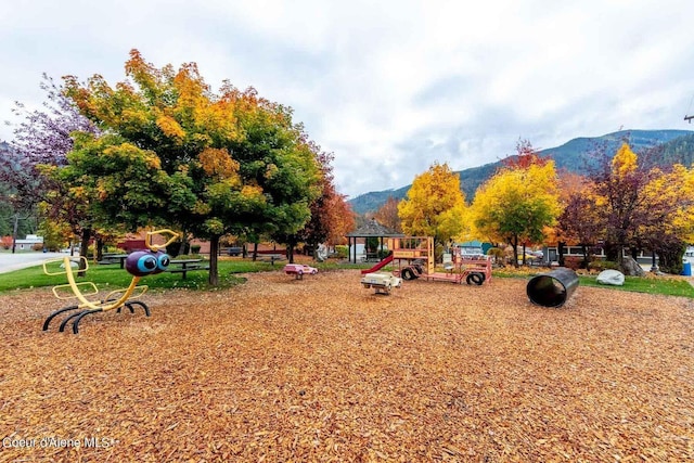 306 2nd St # 3 Id, Mullan, ID 83846 - view of community featuring a mountain view and playground community