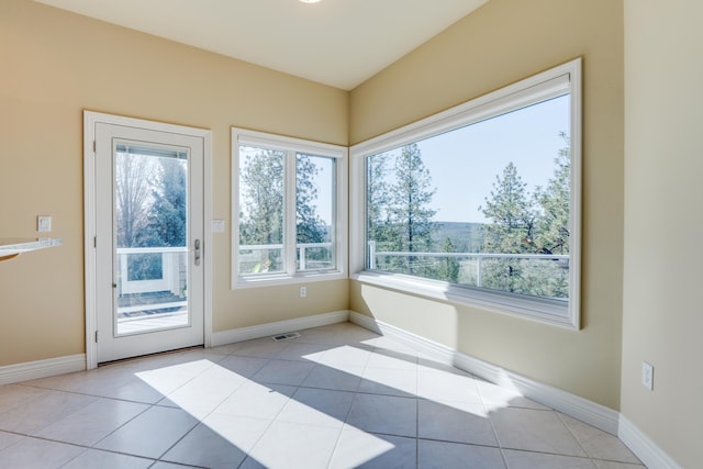 6519 W Kitsap Dr, Spokane, WA 99208 - interior space with visible vents, baseboards, tile patterned floors, and plenty of natural light