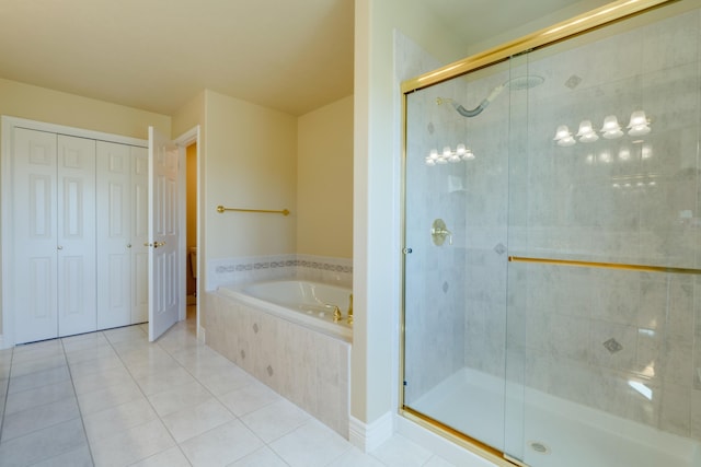 6519 W Kitsap Dr, Spokane, WA 99208 - bathroom featuring a stall shower, a garden tub, and tile patterned flooring
