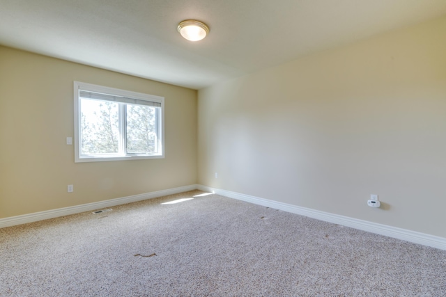 6519 W Kitsap Dr, Spokane, WA 99208 - carpeted spare room with visible vents and baseboards