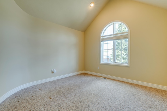 6519 W Kitsap Dr, Spokane, WA 99208 - carpeted spare room featuring visible vents, vaulted ceiling, and baseboards