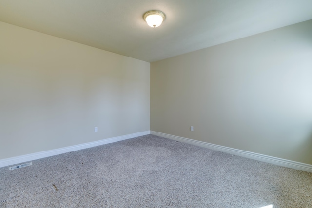 6519 W Kitsap Dr, Spokane, WA 99208 - empty room featuring carpet, visible vents, and baseboards