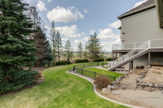 6519 W Kitsap Dr, Spokane, WA 99208 - view of yard with a deck, stairway, and fence
