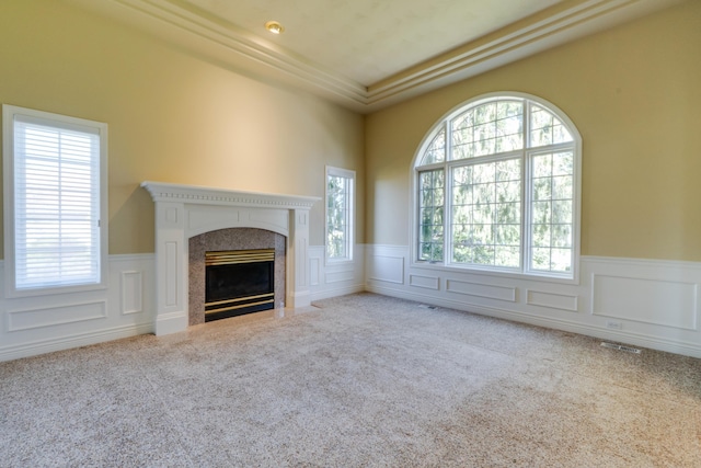 6519 W Kitsap Dr, Spokane, WA 99208 - unfurnished living room featuring carpet, a decorative wall, and wainscoting