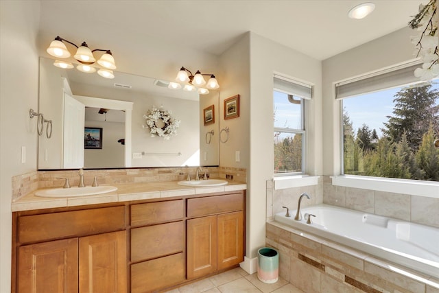 6610 S Springview St, Spokane, WA 99224 - full bathroom with double vanity, a garden tub, and tile patterned flooring