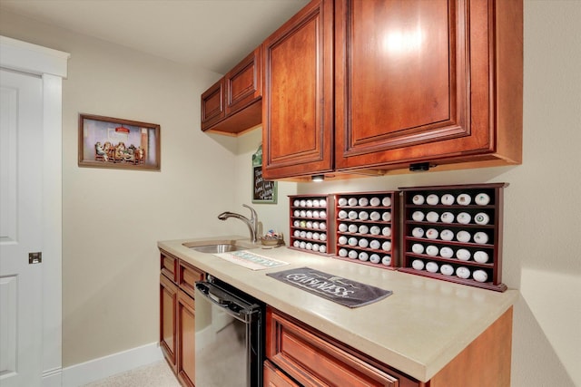 6610 S Springview St, Spokane, WA 99224 - kitchen featuring dishwashing machine, brown cabinets, and light countertops