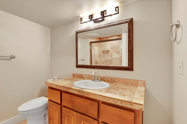 6610 S Springview St, Spokane, WA 99224 - bathroom with vanity and toilet