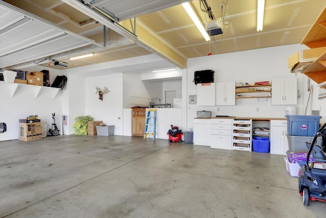 6610 S Springview St, Spokane, WA 99224 - garage featuring a garage door opener
