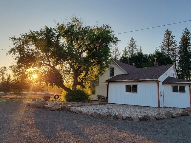 view of home's exterior featuring a chimney