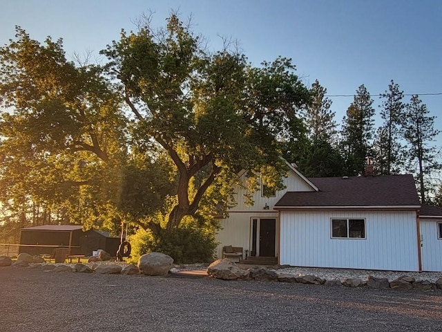 view of front of property with a chimney