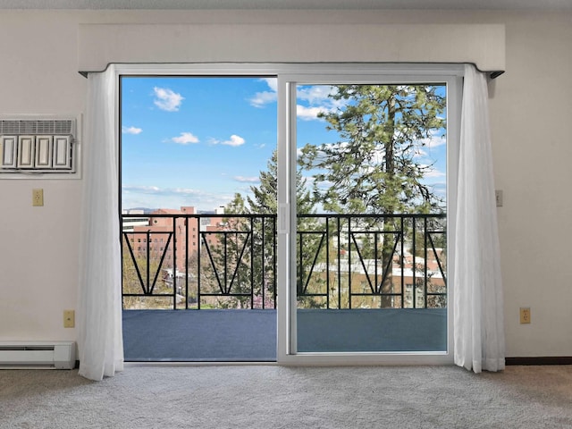 doorway with baseboard heating and carpet floors