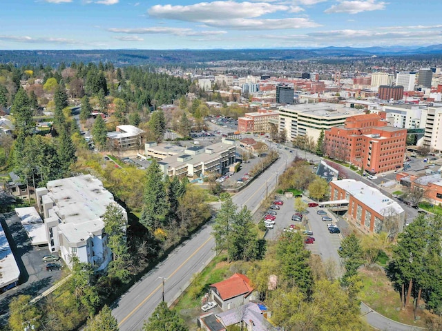 birds eye view of property featuring a view of city