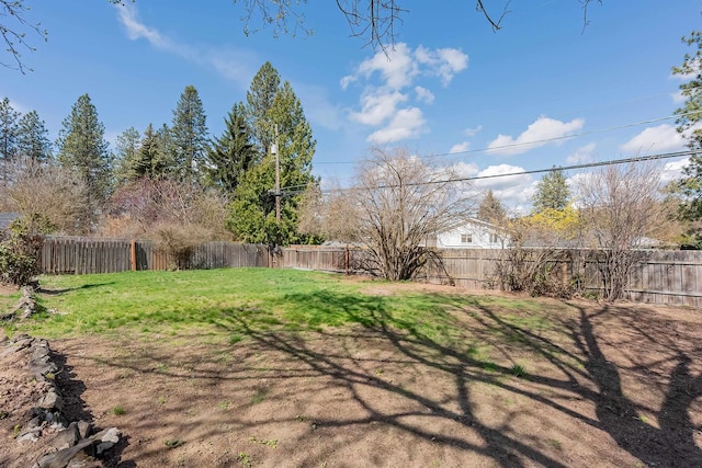 view of yard featuring a fenced backyard