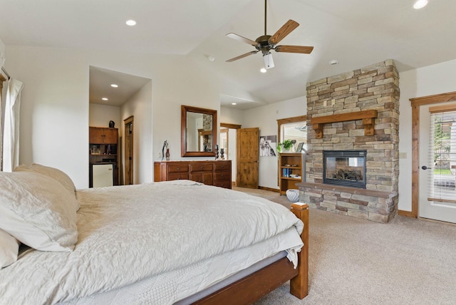 bedroom with a fireplace, recessed lighting, vaulted ceiling, access to exterior, and carpet flooring